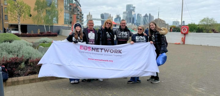  EOS Network charity team with banner at London event to unite against eosinophilic diseases